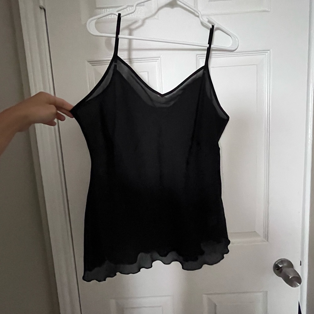 1X. Black tank top